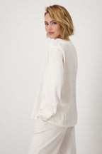Blusa MONARI satinada color crudo