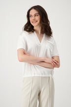 Blusa MONARI con bolsillo joya