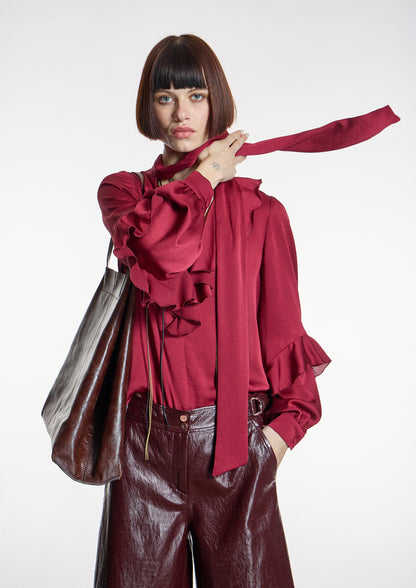 Blusa ALBA CONDE granate con volantes