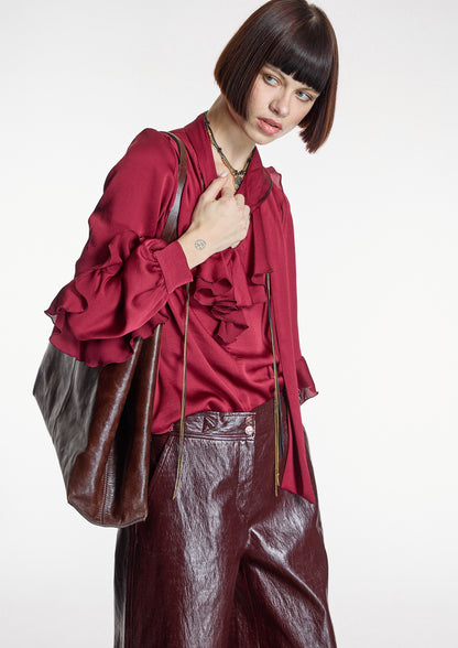 Blusa ALBA CONDE granate con volantes