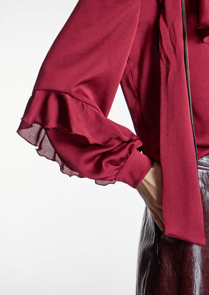 Blusa ALBA CONDE granate con volantes