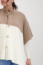 Capa MONARI de punto bicolor