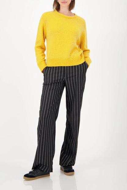 Jersey MONARI punto suave en color amarillo