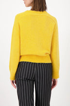 Jersey MONARI punto suave en color amarillo