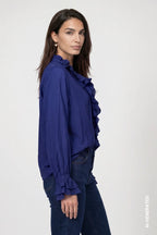 Blusa MONARI azul con volantes