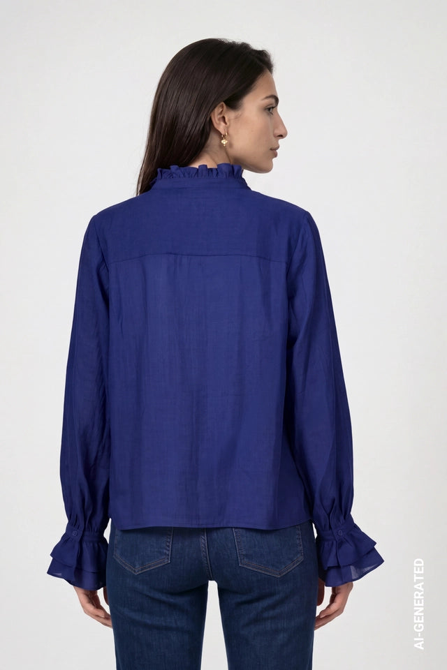 Blusa MONARI azul con volantes