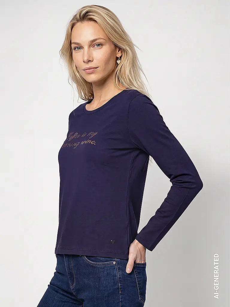 Camiseta MONARI azul con letras de pedrería