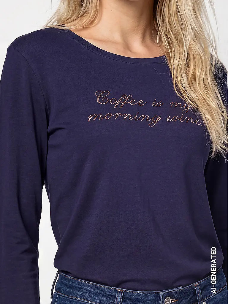 Camiseta MONARI azul con letras de pedrería