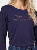 Camiseta MONARI azul con letras de pedrería