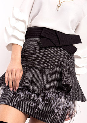 Falda ALBA CONDE jaspeada con volante en cadera