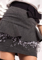 Falda ALBA CONDE jaspeada con volante en cadera